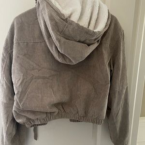 Cute fuzzy cropped jacket. Size medium fits like a small.